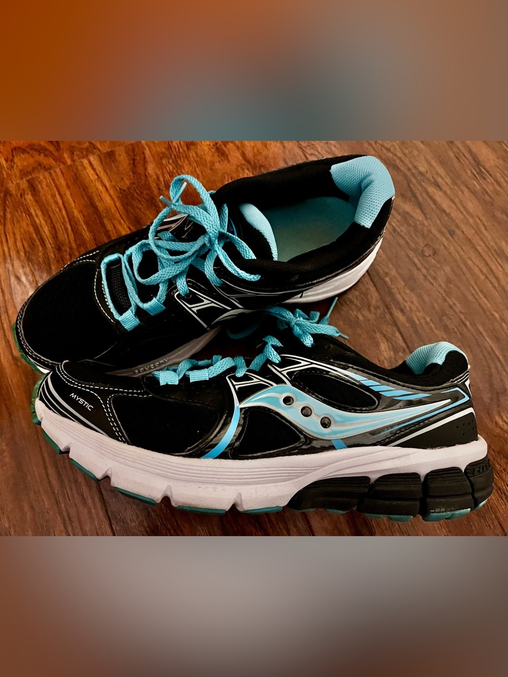 Saucony Women's mystic Black and Aqua Supportive Running Shoes